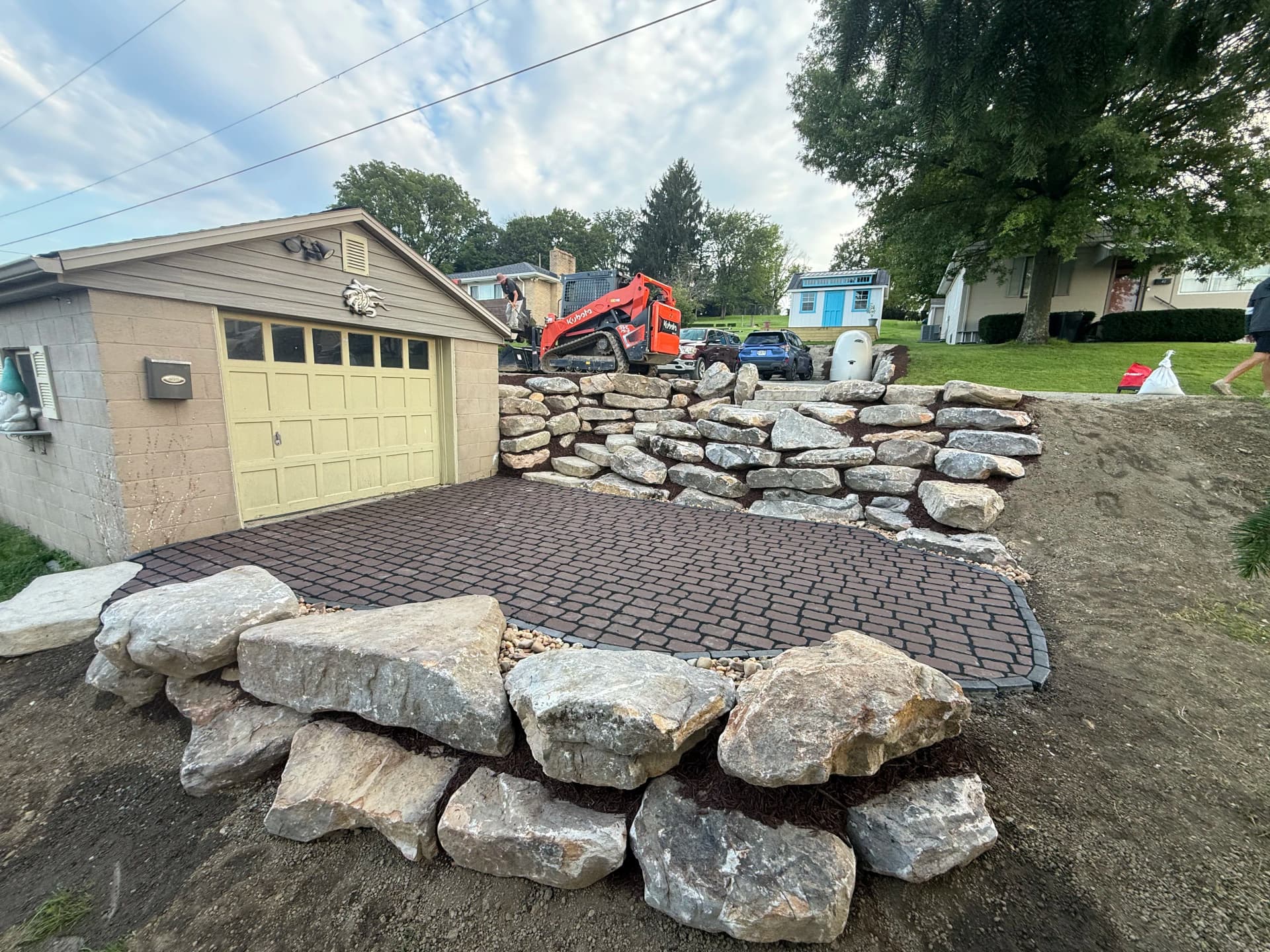 Gallery photos for Steep Driveway Slope Gets a Boulder Wall and Paver Patio Upgrade: Image #2