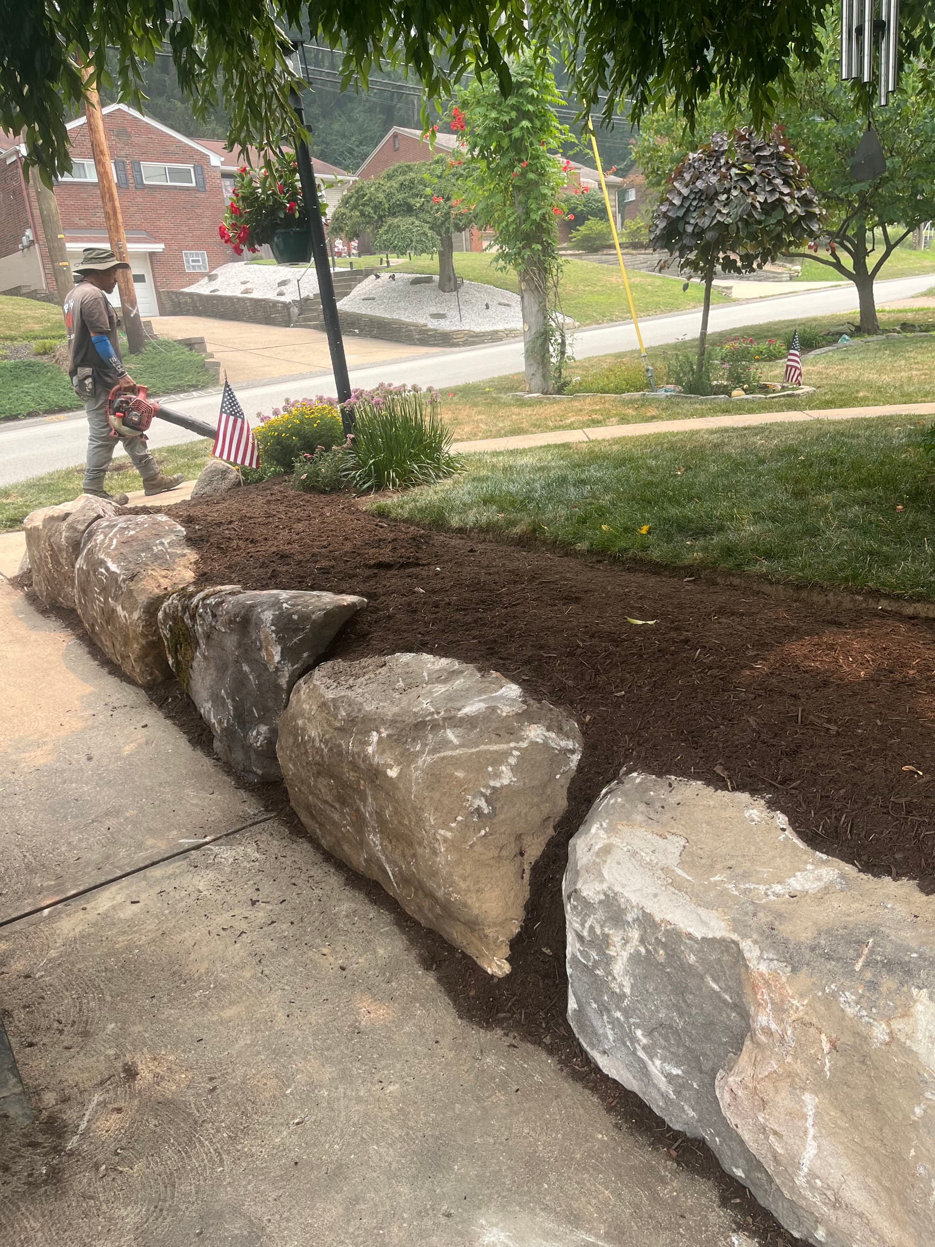 Gallery photos for Boulder Wall and Fresh Mulch Give This Front Bed a Sharp New Edge: Image #2