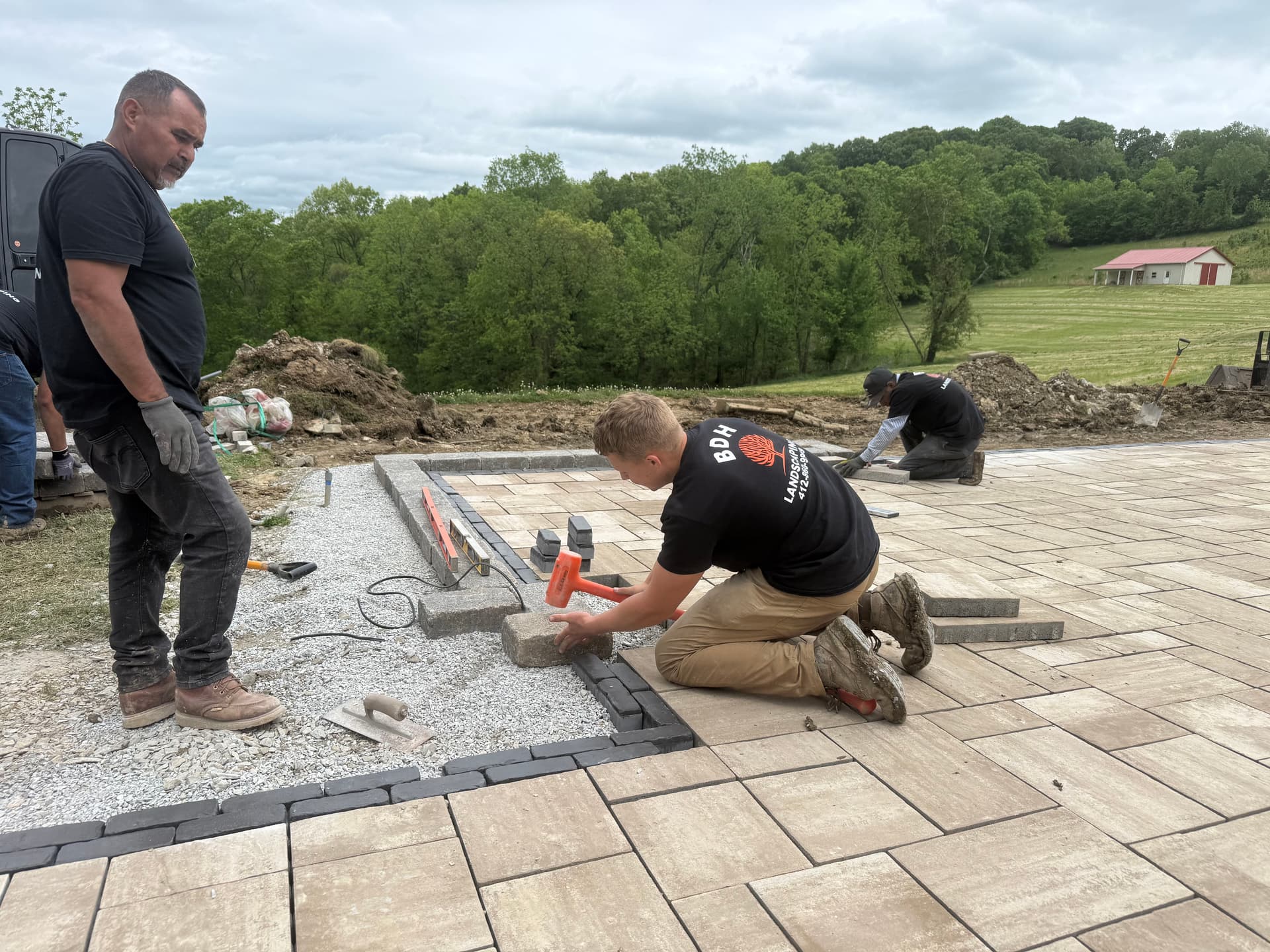 Hardscape Crew Hard at Work Building Patios That Last image