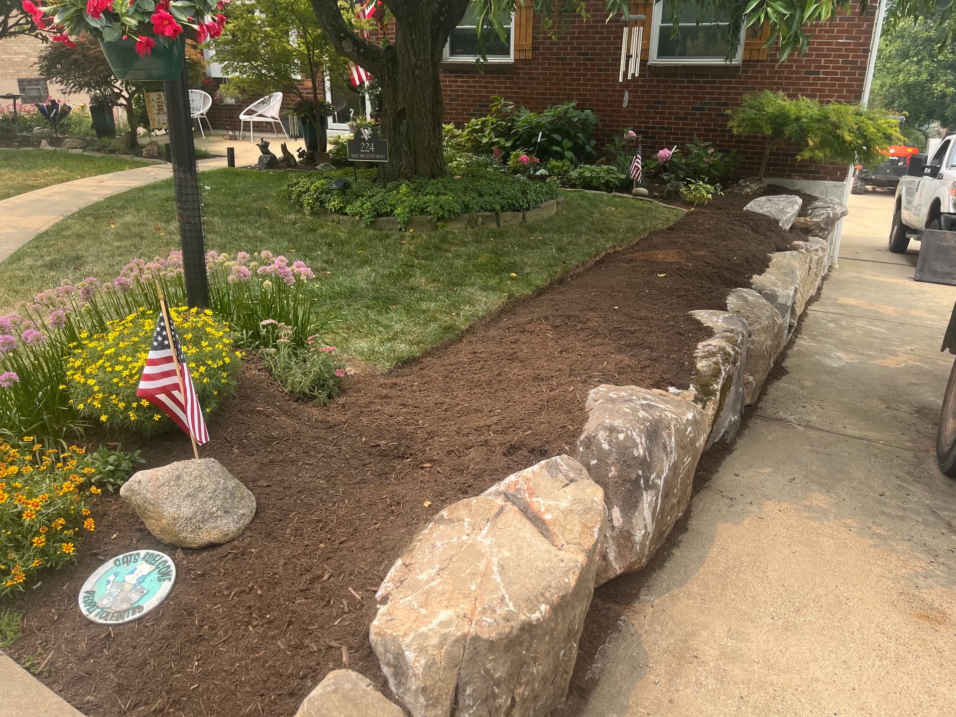Gallery photos for Boulder Wall and Fresh Mulch Give This Front Bed a Sharp New Edge: Image #1