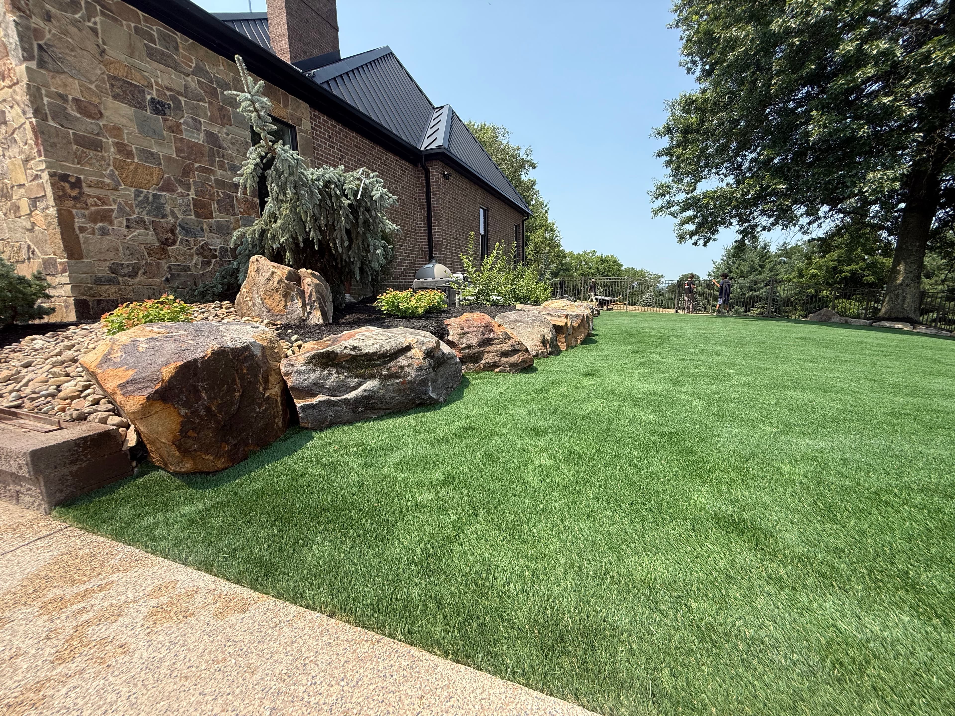 Project Turf Install and Boulder Landscape Design That Actually Holds Up image